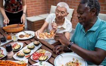 Family enjoying a meal on the patio